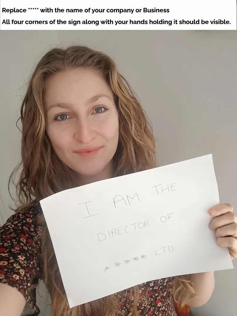 Girl Selfie Holding sign I am the director